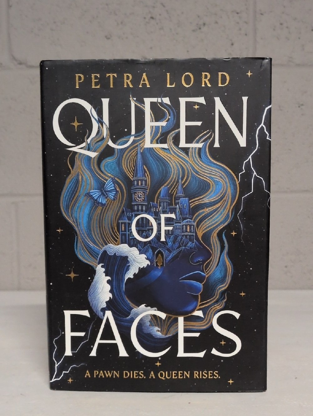 Queen of Faces by Petra Lord - Hardcover Novel, brand new